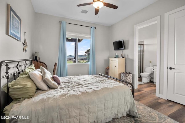 9820 N Echo Ridge Cir, Prescott Valley, AZ 86315 - bedroom featuring a ceiling fan, visible vents, ensuite bathroom, and wood finished floors