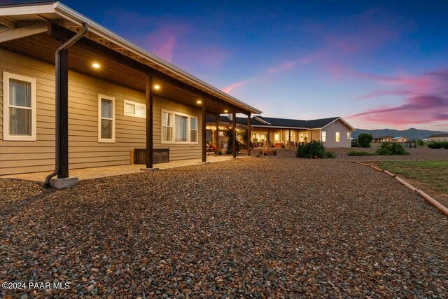9820 N Echo Ridge Cir, Prescott Valley, AZ 86315 - rear view of house featuring a patio area