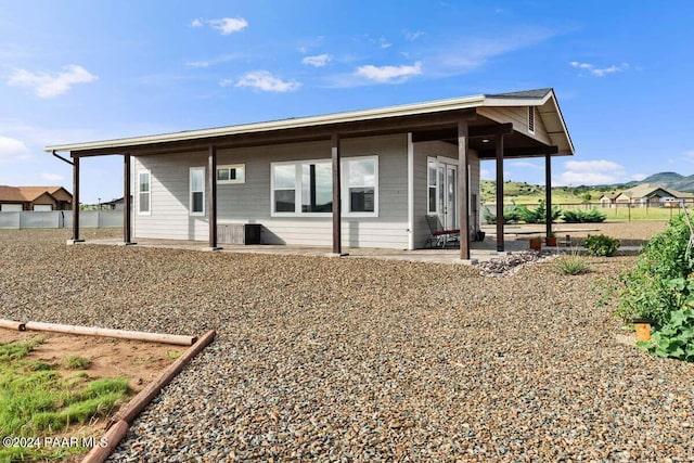 9820 N Echo Ridge Cir, Prescott Valley, AZ 86315 - back of house featuring a patio and fence