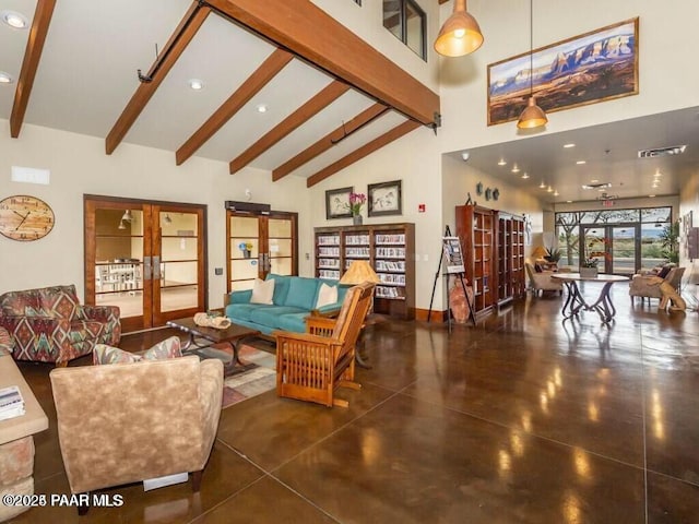 interior space featuring beam ceiling, high vaulted ceiling, and french doors