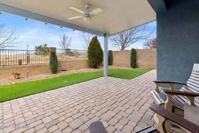 view of patio with ceiling fan