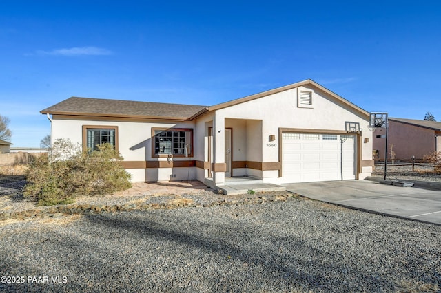 single story home with a garage