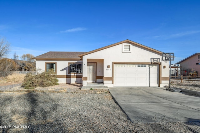 ranch-style home with a garage