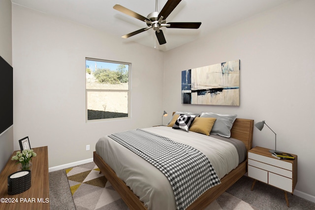 bedroom featuring baseboards, ceiling fan, and carpet