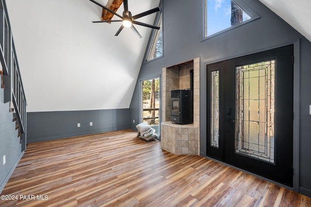 entryway featuring hardwood / wood-style flooring, ceiling fan, and lofted ceiling