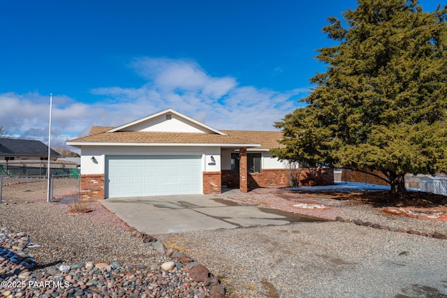 ranch-style home featuring a garage