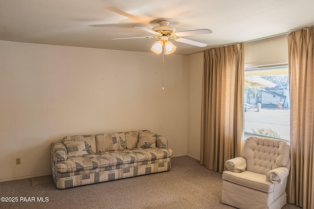 living room featuring ceiling fan and light carpet