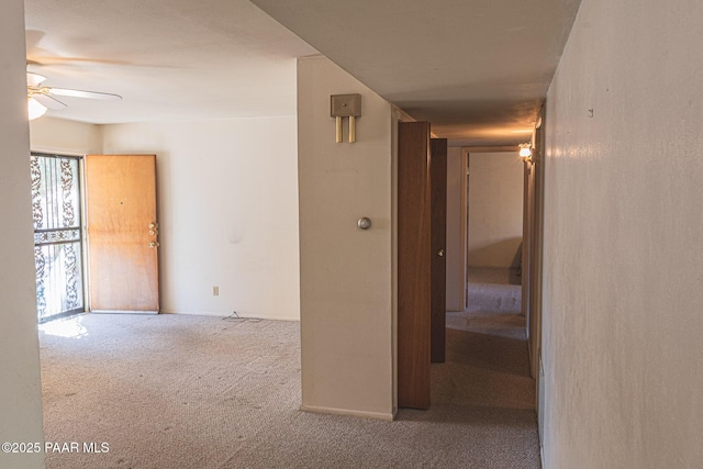 corridor with carpet floors