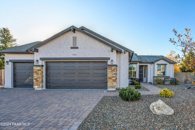 view of front of property featuring a garage