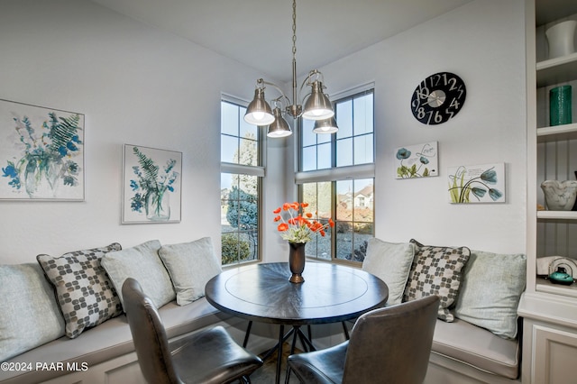 dining room with a notable chandelier