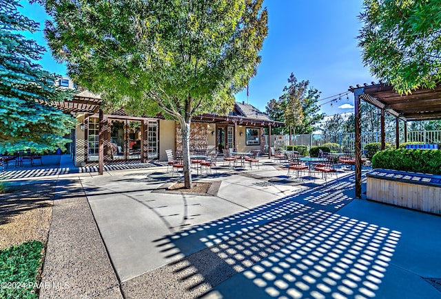 exterior space featuring a pergola and a patio area