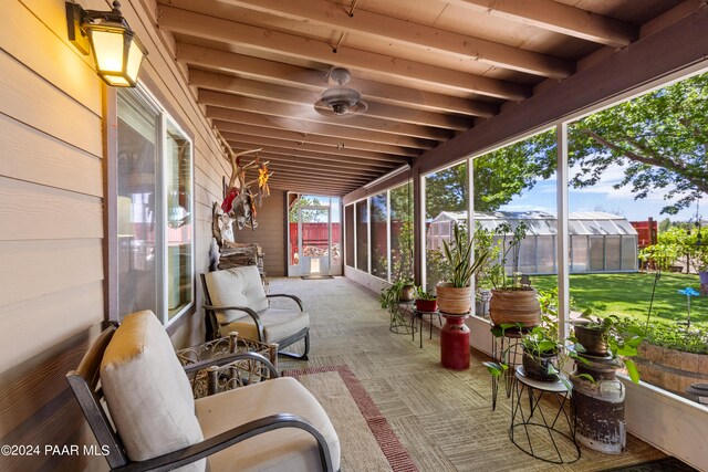 sunroom / solarium with beam ceiling