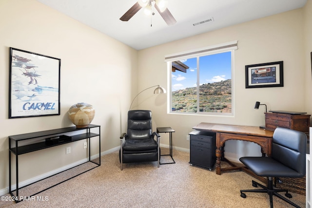 office with ceiling fan and light carpet