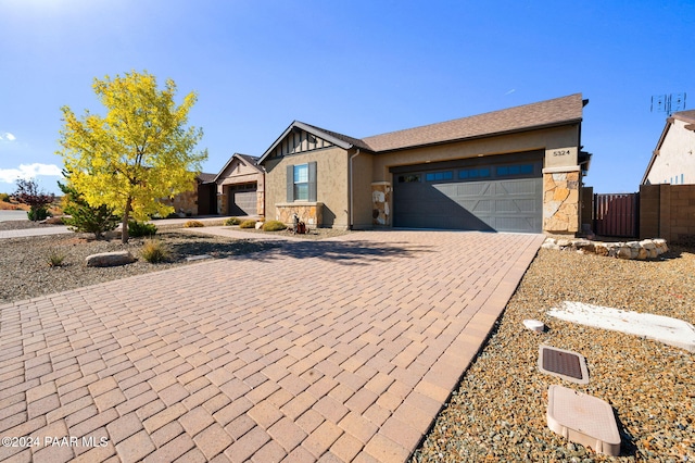 ranch-style home with a garage