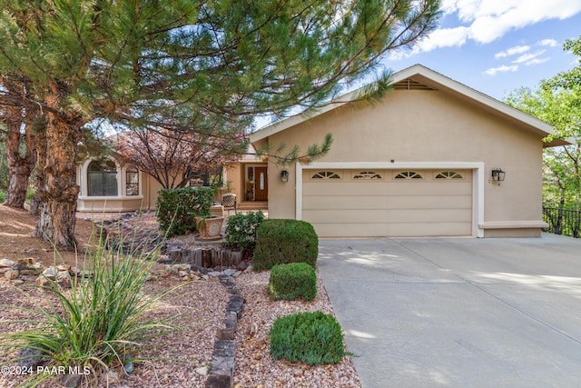 view of front of home with a garage