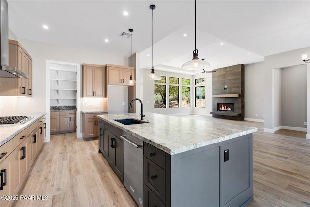 1052 N Cloud Cliff Pass, Prescott Valley, AZ 86314 - kitchen with a sink, appliances with stainless steel finishes, light wood-style floors, wall chimney exhaust hood, and recessed lighting