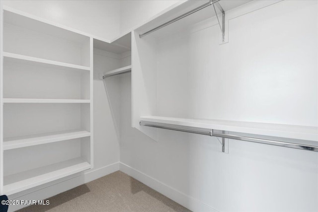 1052 N Cloud Cliff Pass, Prescott Valley, AZ 86314 - walk in closet with carpet flooring