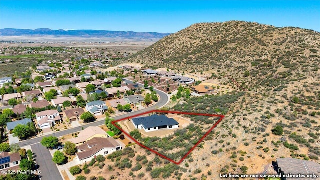 1052 N Cloud Cliff Pass, Prescott Valley, AZ 86314 - aerial view of residential area with property boundaries highlighted and mountains