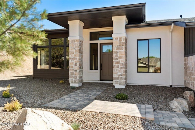 1052 N Cloud Cliff Pass, Prescott Valley, AZ 86314 - doorway to property featuring stone siding and stucco siding