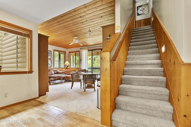 staircase with ceiling fan