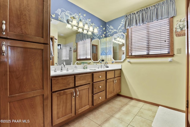 bathroom with tile patterned floors and vanity