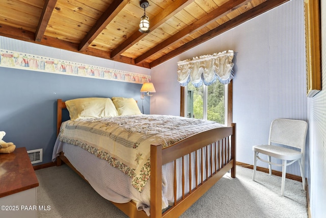 bedroom featuring vaulted ceiling with beams, light carpet, and wood ceiling