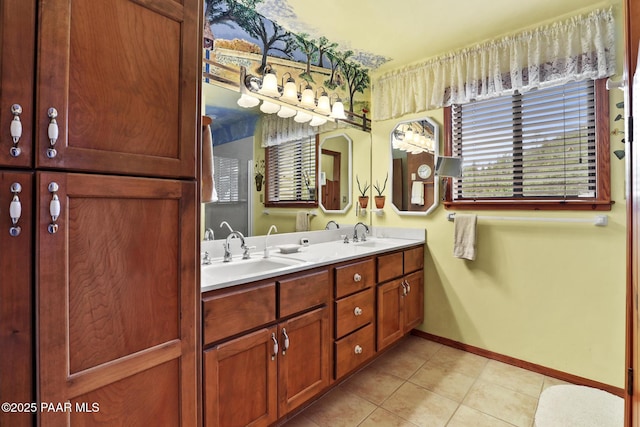 bathroom featuring tile patterned flooring and vanity