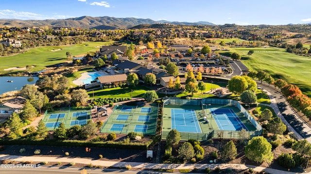 birds eye view of property featuring a mountain view and view of golf course