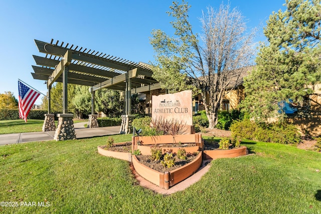 view of home's community with a lawn and a pergola