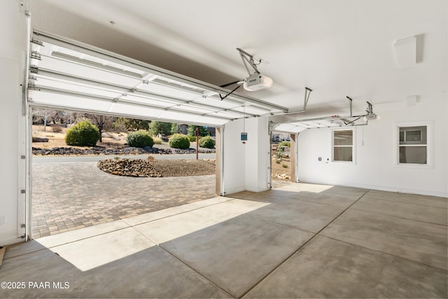 garage featuring a garage door opener