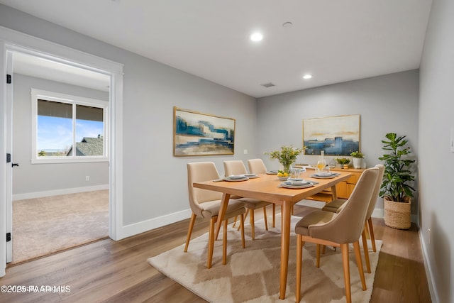 dining space featuring recessed lighting, visible vents, baseboards, and wood finished floors