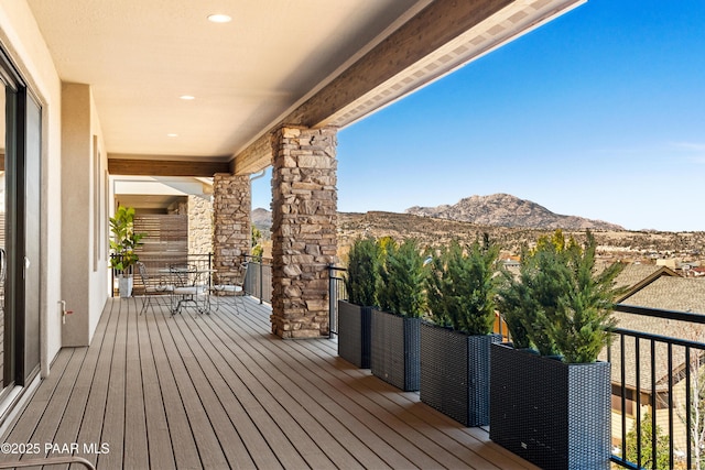 deck with a mountain view