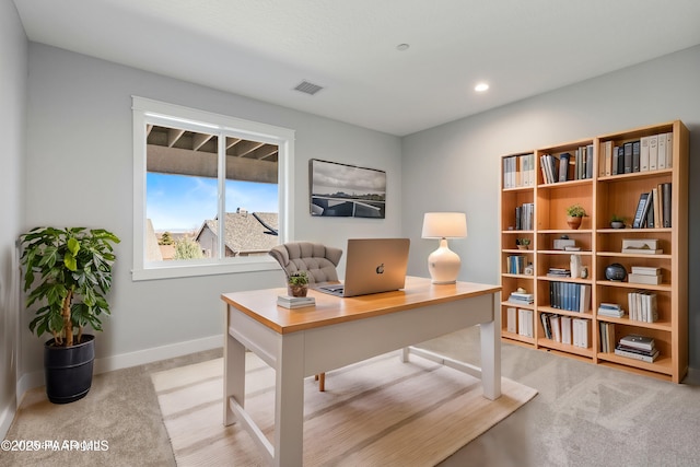 carpeted office with recessed lighting, baseboards, and visible vents