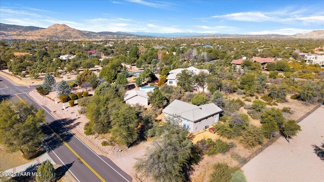 birds eye view of property featuring a mountain view