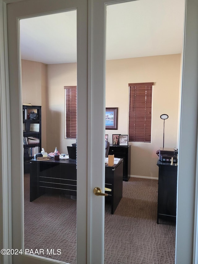 view of carpeted home office