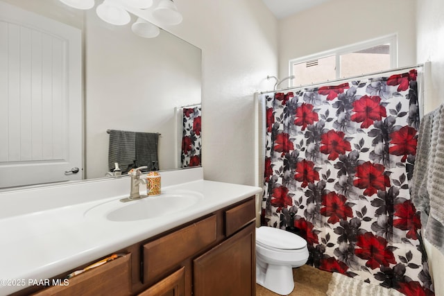 full bath with a shower with shower curtain, toilet, and vanity