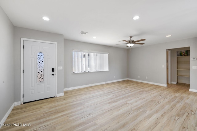 entrance foyer featuring ceiling fan and light hardwood / wood-style flooring