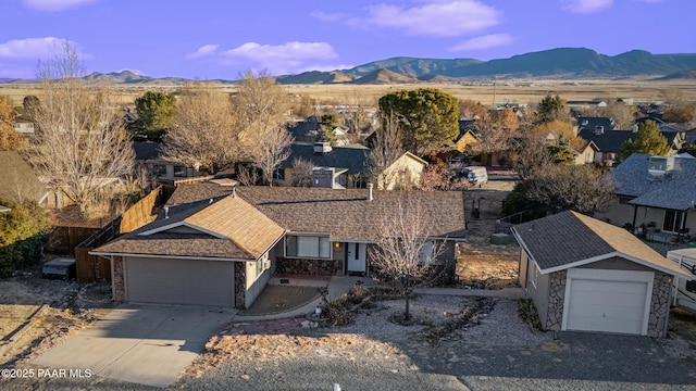 drone / aerial view featuring a mountain view