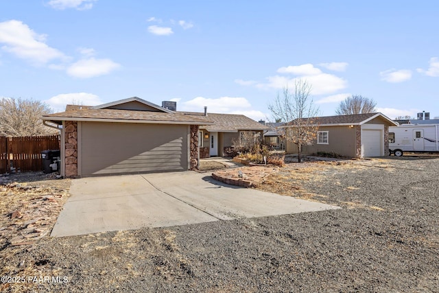 ranch-style house featuring a garage