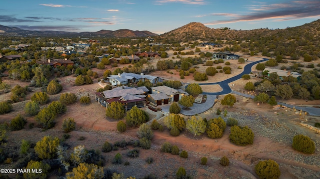 aerial view at dusk with a mountain view