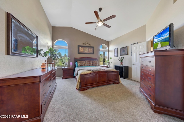 carpeted bedroom with multiple windows, lofted ceiling, and ceiling fan