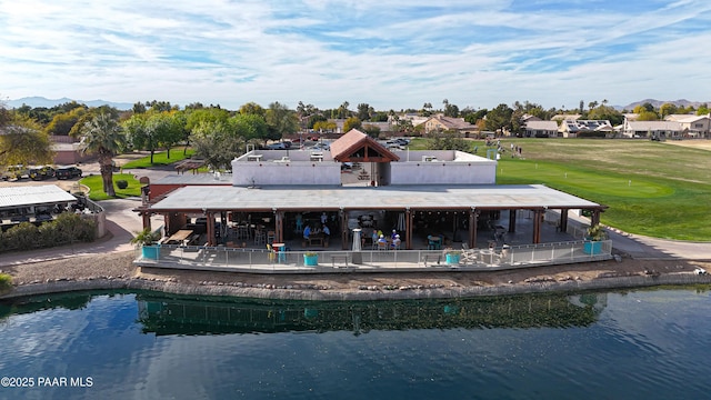 back of house featuring a water view