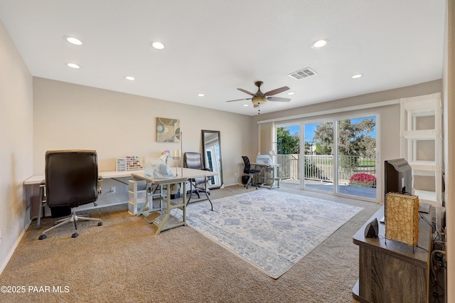 home office featuring carpet and ceiling fan