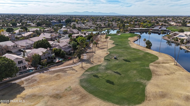 aerial view featuring a water and mountain view