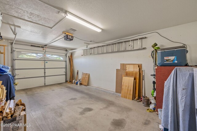 9341 E Manzanita Cir, Prescott Valley, AZ 86314 - garage featuring a garage door opener
