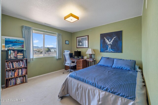 9341 E Manzanita Cir, Prescott Valley, AZ 86314 - carpeted bedroom with baseboards and visible vents