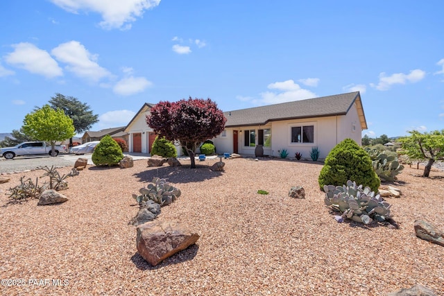 9341 E Manzanita Cir, Prescott Valley, AZ 86314 - ranch-style house with an attached garage and driveway