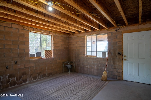 misc room with concrete flooring