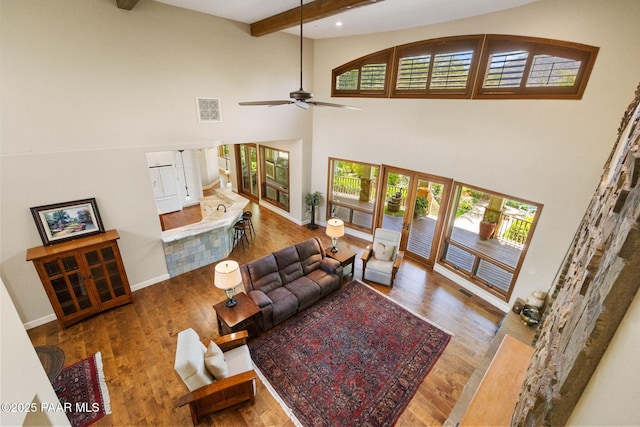 2469 W Post Oak Dr, Prescott, AZ 86305 - living area featuring a high ceiling, plenty of natural light, wood finished floors, ceiling fan, and recessed lighting