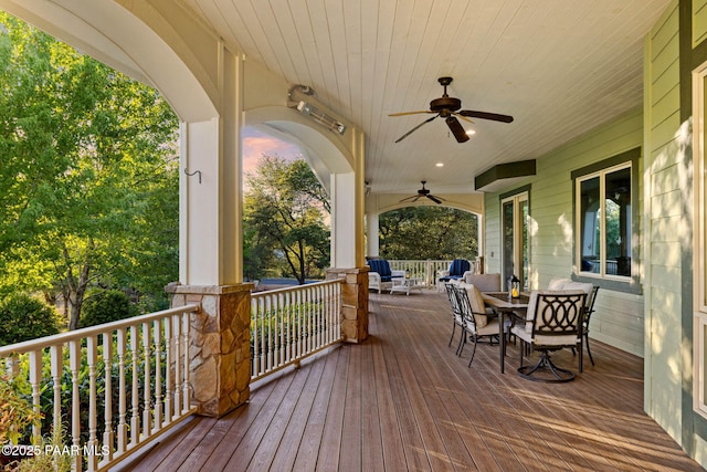 2469 W Post Oak Dr, Prescott, AZ 86305 - porch with a ceiling fan and outdoor dining area